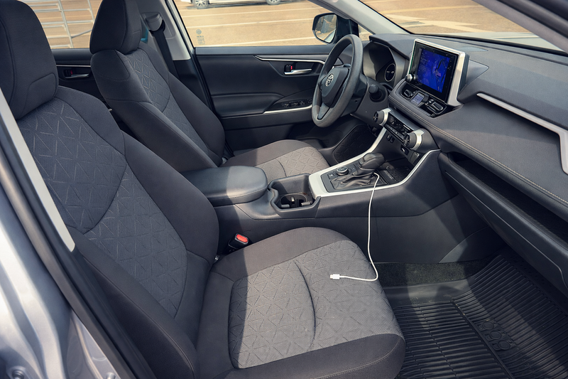 Car interior with gray seats and dashboard view